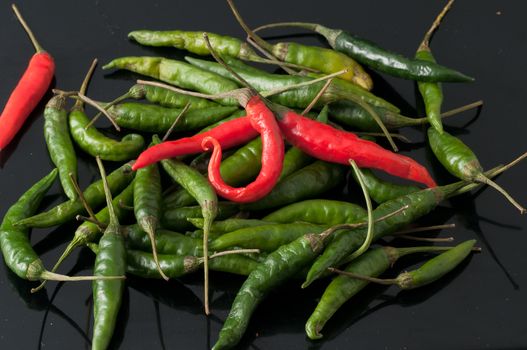 green chili peppers and red