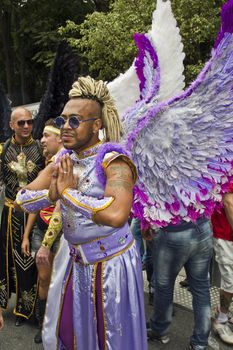 SAO PAULO, BRAZIL - June 7, 2015: An unidentified man  wearing costume and celebrating lesbian, gay, bisexual, and transgender culture in the 19º Pride Parade Sao Paulo.