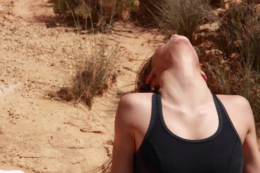 woman doing yoga in the desert