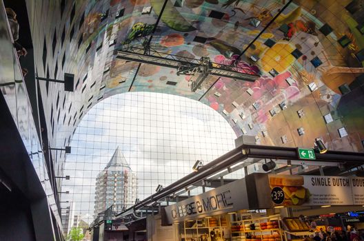 Rotterdam, Netherlands - May 9, 2015: Retail Shop in Markthal (Market hall) a new icon in Rotterdam. The covered food market and housing development shaped like a giant arch by Dutch architects MVRDV.