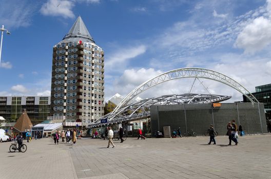 Rotterdam, Netherlands - May 9, 2015: Pencil tower, cube houses and Blaak Station in the center of the city on May 9, 2015, in Rotterdam, Blaak district, The Netherlands