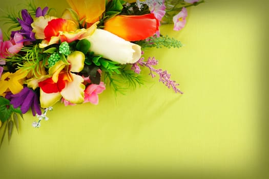 flower arrangement on a green background with blank  for advertisement