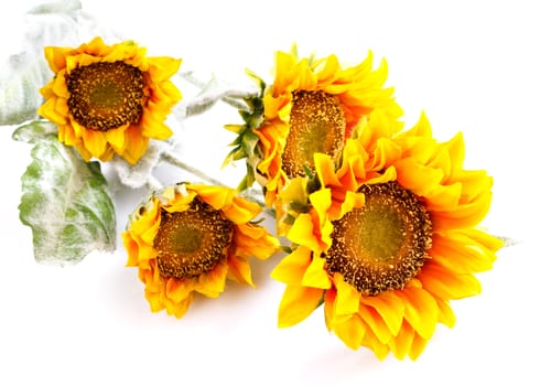 artificial sunflowers on a white background
