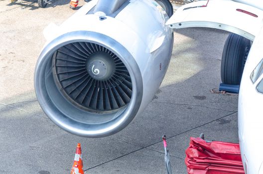 Closeup, detail of an aircraft jet engine of a commercial aircraft.