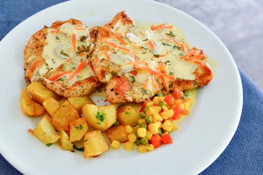 Picture of a Grilled garnish chicken steaks