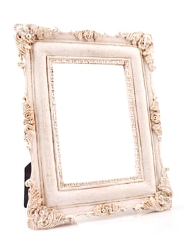 Empty white vintage frame isolated on white

