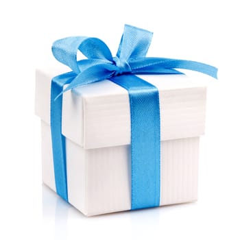 white gift box with blue ribbon and bow isolated on white