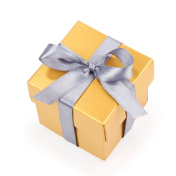 yellow gift box with silwer ribbon and bow isolated on white top view, clipping path