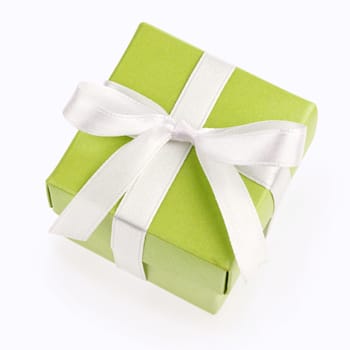green gift box with white ribbon and bow isolated on white with clipping path top view