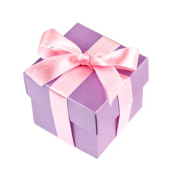 lilac gift box with pink ribbon and bow isolated on white top view