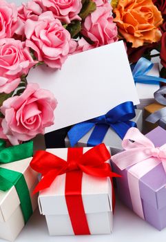 Greeting card with flowers and gift boxes