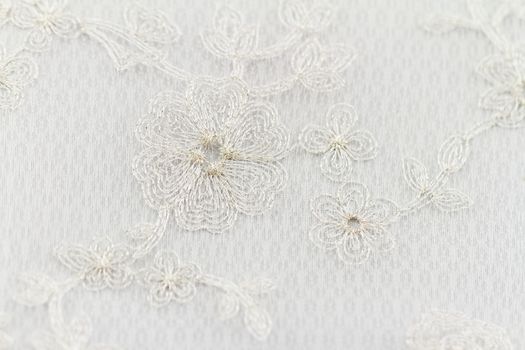 Beautiful lace with flower pattern - macro photo