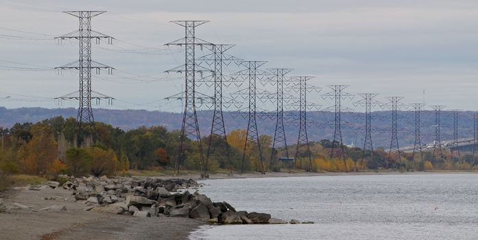 The electrical posts near the water