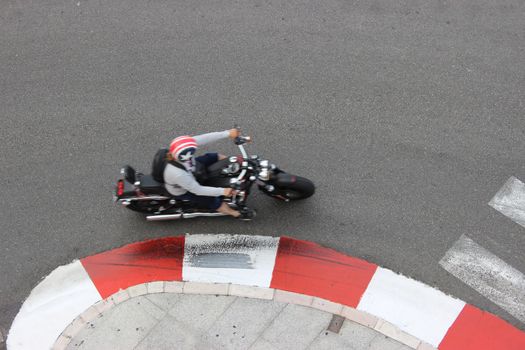 A motorcyclist on a motorcycle. Monaco Top View