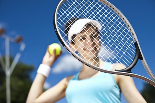 Woman playing tennis, natural colorful tone