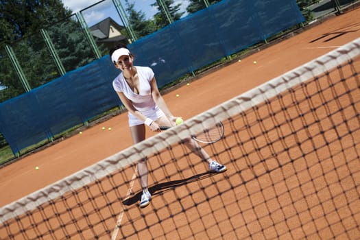 Woman playing tennis, natural colorful tone