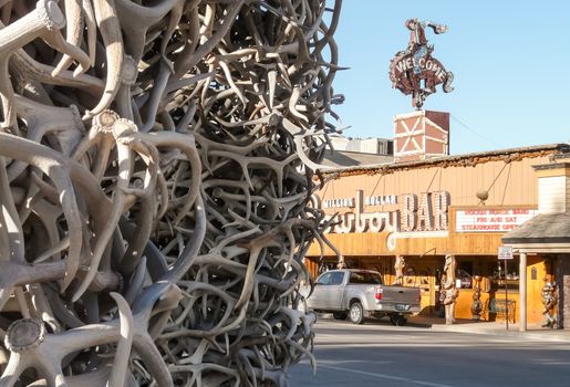 Jackson Hole, WY, USA - May 13, 2008: Legendary Million Dollar Cowboy Bar in center of Jackson Hole, with part of antler arch in front.