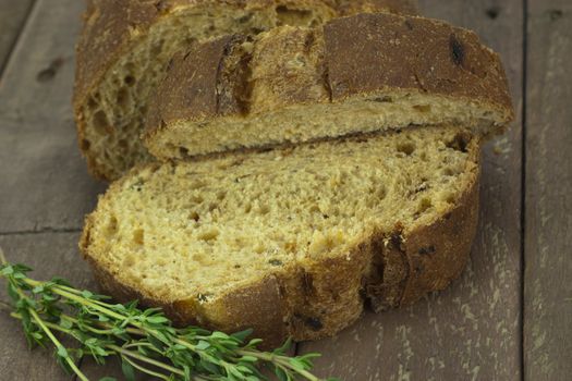 Loaf of wholemeal brown bread cut ready to serve