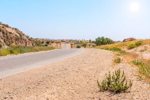 Asphalt Road above Grand Crater in Negev Desert, Israel