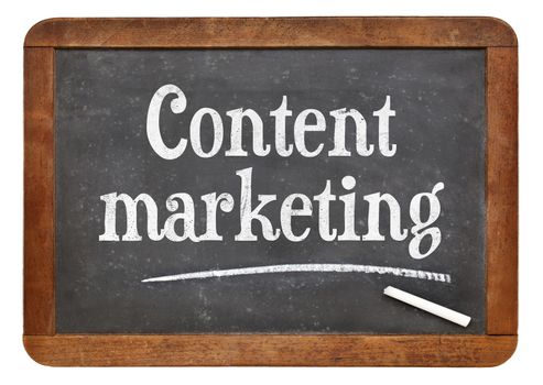 Content marketing sign - text on an isolated vintage slate blackboard