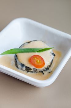 close up sushi roll with cream sauce , japanese cuisine in white bowl