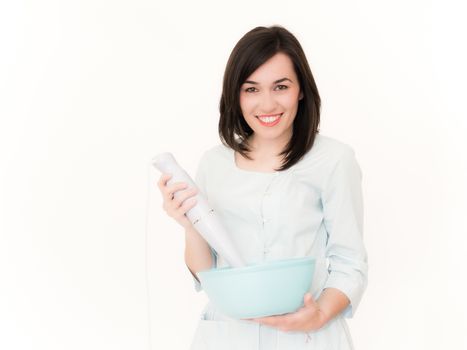 Beautiful Housewife with Hand Blender on White Background Looking at Camera