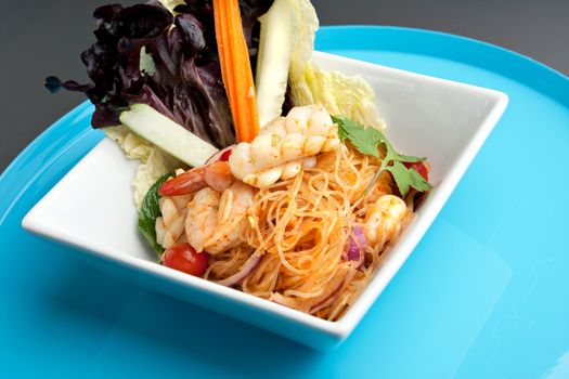 Thailand style shrimp and seafood salad with veggies.