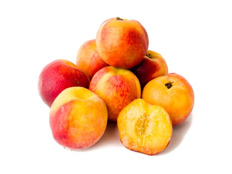 Peach fruit whole and in half peach isolated over white background.