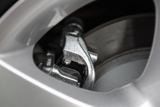 Disc Brake. Disc Pads, Wheel Bearing, Caliper Assembly. Car Brakes Closeup