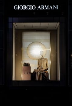 SYDNEY, AUSTRALIA, MAY 26, 2015;  Retail shop window display of female clothing and accessories and visual merchandising of Giorgio Armani, Sydney