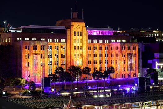 SYDNEY, AUSTRALIA - JUNE 2, 2015;  Vivid lights up the Musuem of Contemporary Art Building in a variety of ever changing colours and patterns.  Elevated view