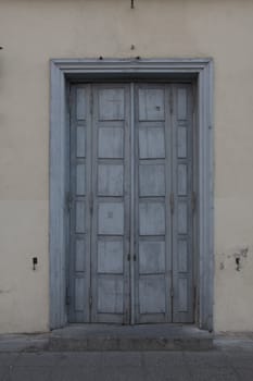 wooden door of middle ages house in old town