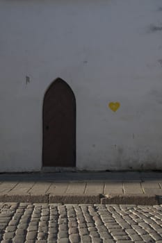 wooden door of middle ages house in old town