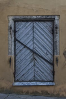 wooden door of middle ages house in old town