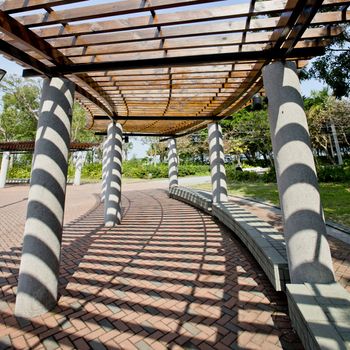 Covered walkway in the park on a Sunny Day