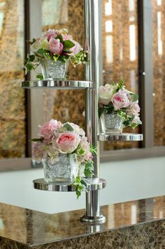 Glass vase with flowers, a beautiful ornament in a wedding