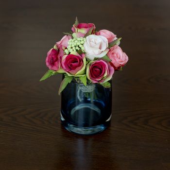 Glass vase with flowers, a beautiful ornament in a wedding