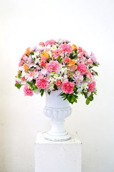 Glass vase with flowers, a beautiful ornament in a wedding