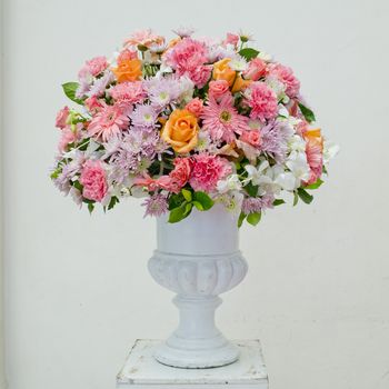 Glass vase with flowers, a beautiful ornament in a wedding