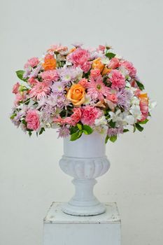 Glass vase with flowers, a beautiful ornament in a wedding