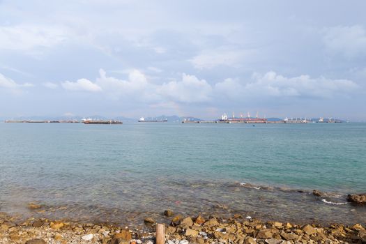 Barges moored in the sea Near the coast of the port.