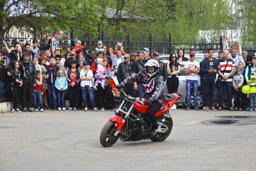 Moto free style pilot stunting on the square - Pyatigorsk, Russia, Opening of moto season 2015 on 1st May 2015