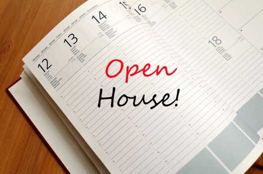 Business Notepad on wooden table Open house concept