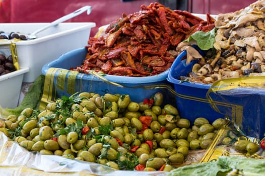 olives, tomatoes and mushrooms to the market