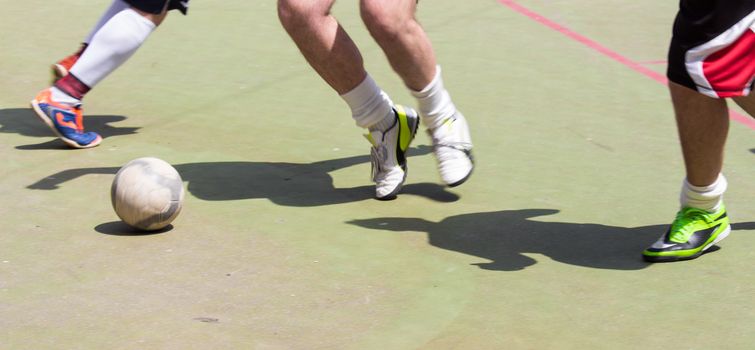 boys playing football in a local tournament