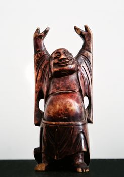 Photograph of a smiling Budha statue