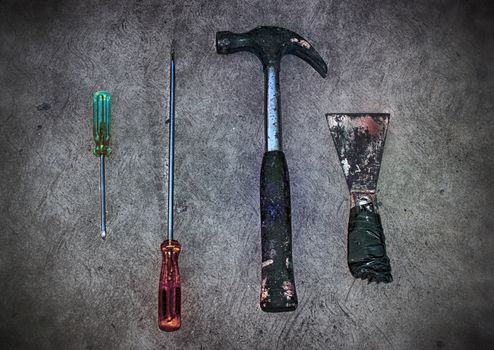 Photograph of some old dirty rusty tools