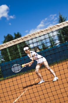 Playing tennis, natural colorful tone