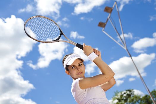 Playing tennis, natural colorful tone