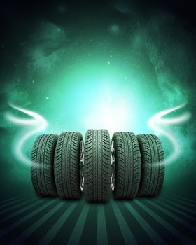 Wedge of new car wheels. Abstract green background is night sky and stripes at bottom